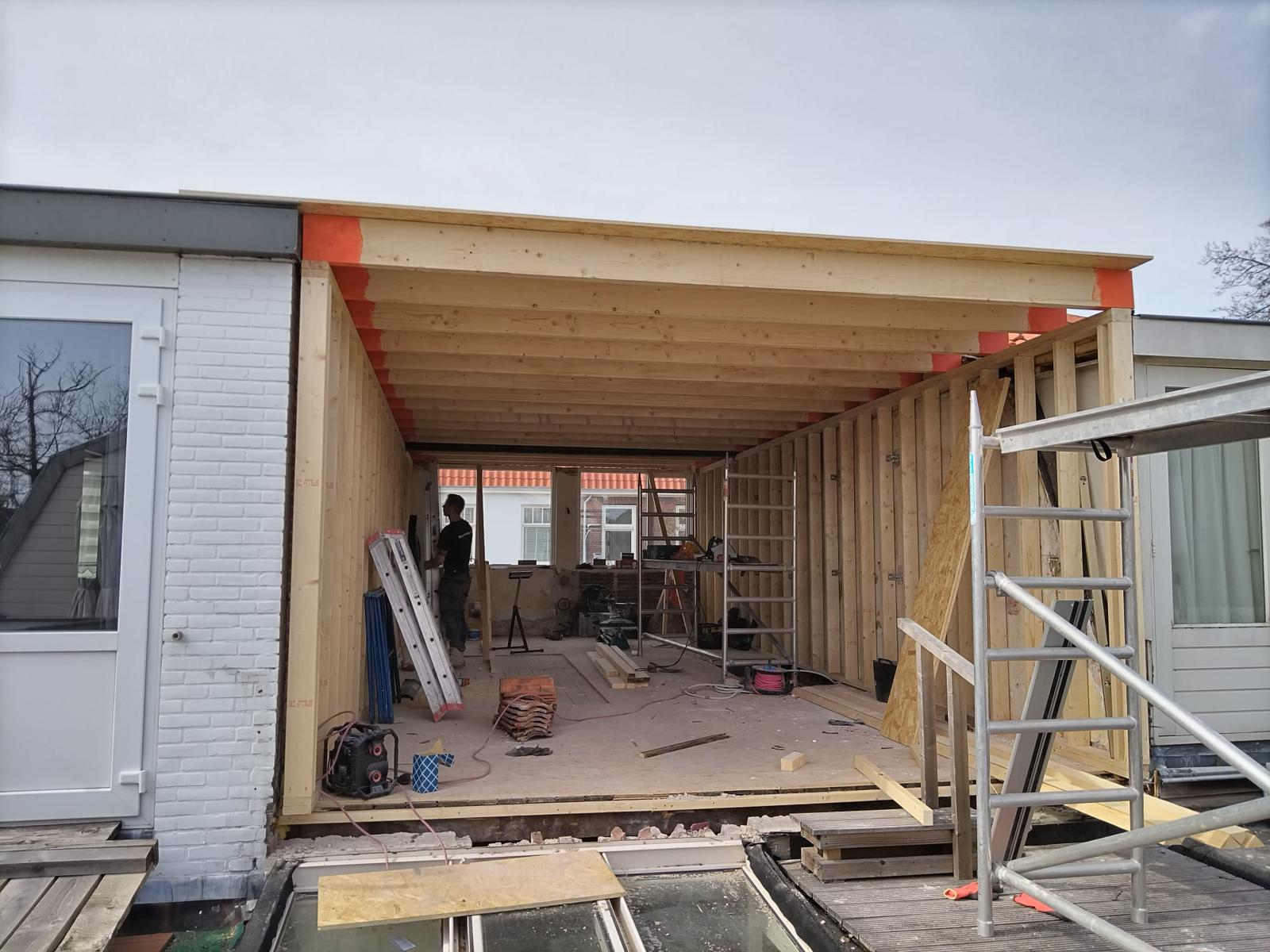 Dakopbouw met overkapping